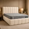 Auro Florence Boucle Luxury Bed angled view in a warm neutral bedroom