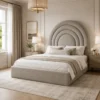 Auro Arcelle upholstered bed with sculpted layered arch headboard, shown from a three-quarter angle