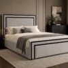 Auro Valtier upholstered bed with framed headboard and matching footboard, shown from a three-quarter angle