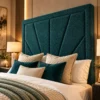 Close-up of the sculpted Art Deco headboard on the Auro Aurelis TV bed.