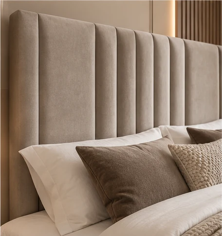 Close-up of the Auro Sora upholstered headboard with vertical channel detailing.