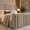 Auro Sora upholstered TV bed in warm mink fabric with the TV concealed.